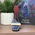 Idium Bottle Bookshelf Sign | A Forbidden Alchemy