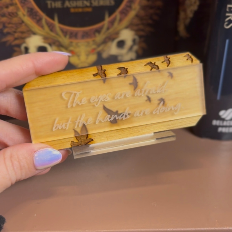 Eyes and Hands Bookshelf Sign | The Road of Bones