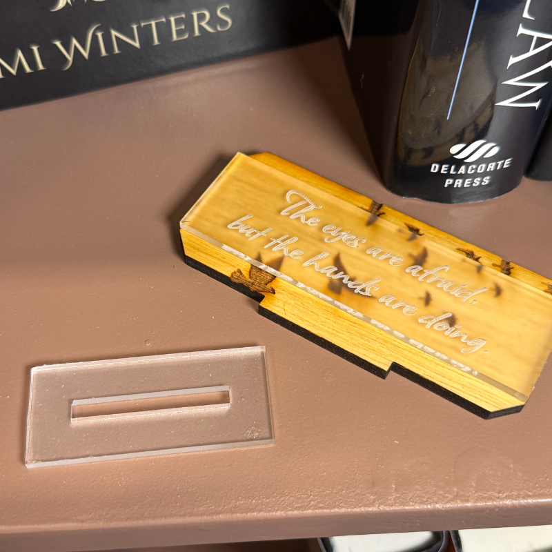 Eyes and Hands Bookshelf Sign | The Road of Bones