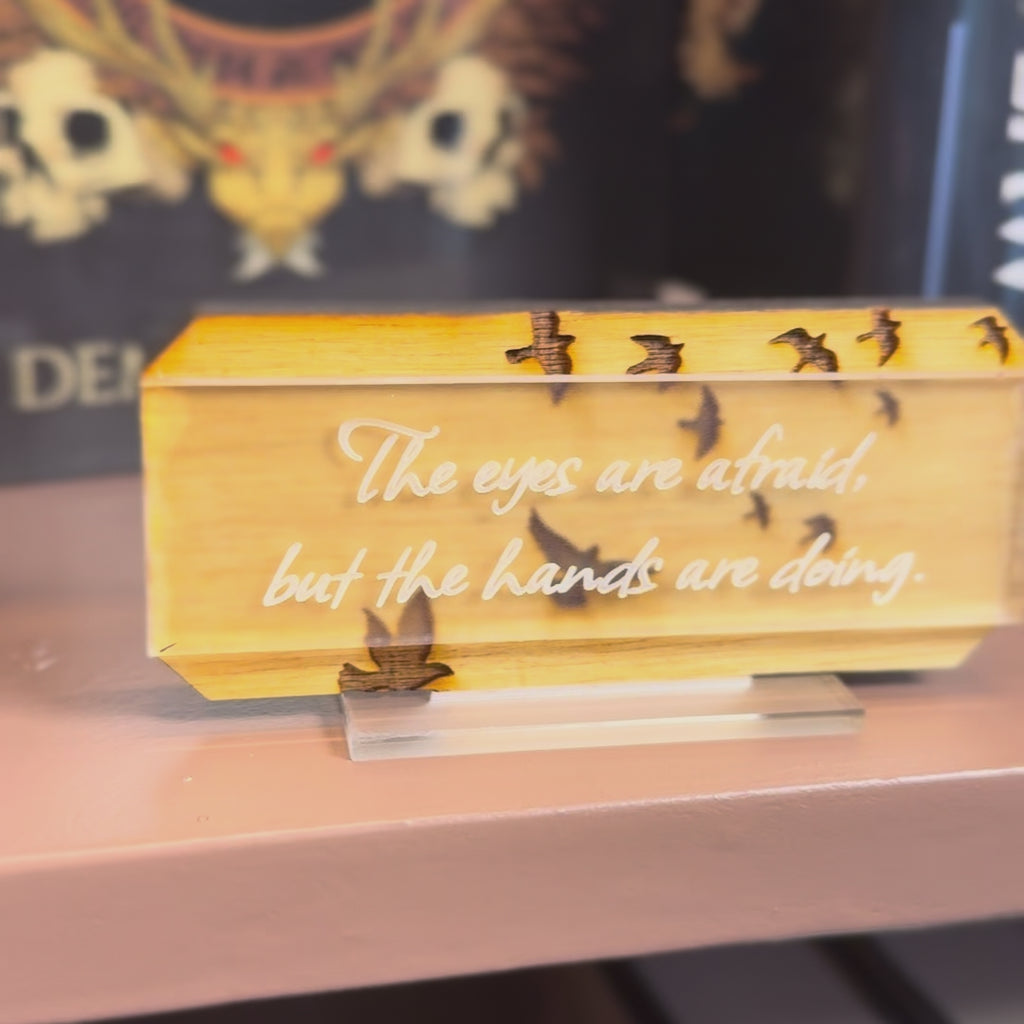 Eyes and Hands Bookshelf Sign | The Road of Bones